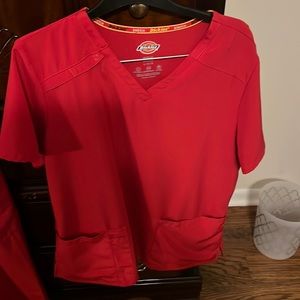 Ladies red scrub size large top medium bottoms 10 dollars a piece